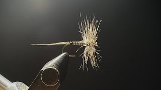 Tying a mosquito with limited hand function