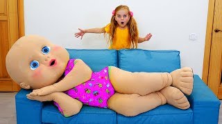 Ulya plays with giant baby doll