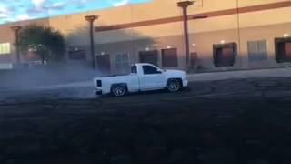 SINGLE CAB SILVERADO DOING DONUTS