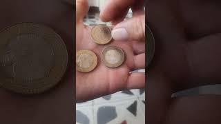 Moneda con giro de 1000 pesos colombianos