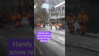 Handy man snow removal on the hi way of Moscow Russia city #trending #viral #happy #shorts