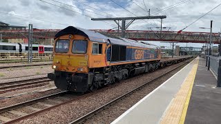 GB Railfreight class 66, 66754 pauses at Cambridge with Salmon flat wagons - 09/06/22