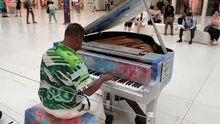 Kris Nicholson playing the World Trade Center Oculus Grand Piano ( Sing For Hope )