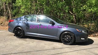 Kia Optima  LX sitting on 20” Versante-240 matte black wheels wrapped with 225/35-20 Lexani tires.