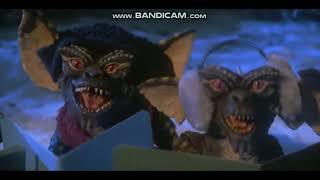 Gremlins sing a Christmas carol