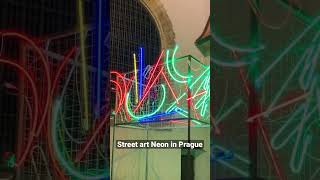 Neon created by Prague street artist Tron.