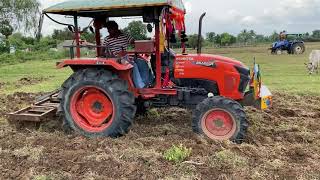 Kubota mu 4501 4wd tractor working with 5 fin cultivator