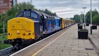 37800 Approaching Wrexham and thrashing back out again. Dragging  507011 & 507015 off for scrap.