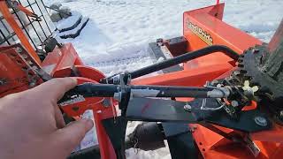 Land Pride SB1064 snow blower modification for chute rotation