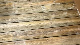 How to seal a deck without it getting on the house