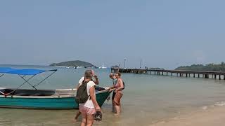 Wading to shore at Ko Mak, Feb. 15, 2024