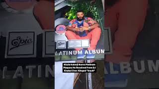 Sizzla burning platinum plaques from DJ Khaled! 🔥🔥 #Sizzla #DJKhaled