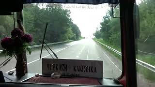 An old tourist bus Ikarus 256 flies along a good road in Ukraine. Hungarian automobile industry