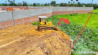 Continue Project, Huge Landfill Near The Road By Bulldozer D31P Pushing Soil And Truck 5T Dumping