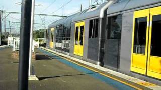 Cityrail T set T5 + T2 leaving Sutherland