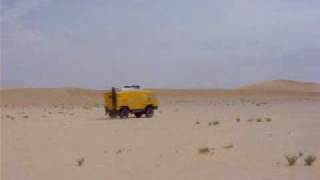 Land Rover 101 crossing the Western Sahara Desert