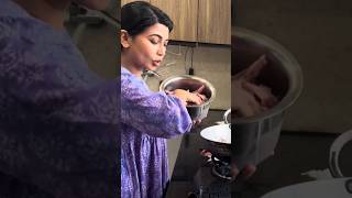 Aimee Boruah cooking chicken