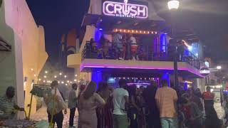 Cabo San Lucas night life.  Walk through a Saturday night scene with clubs and bars.