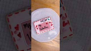 Decorating envelope cookie with royal icing. #decoratedcookies #cookies #cookiedecorating