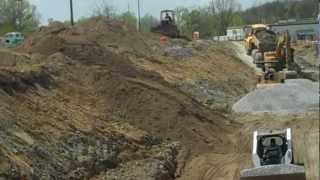 Stone Creek Retaining Wall Rebuild in Full Swing