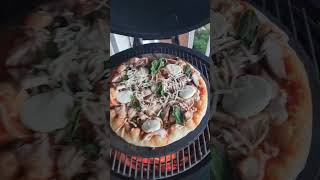 Redneck pizza on coals. #pizza #bbq