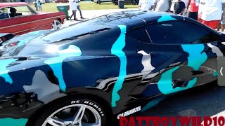 camo wrapped C8 Corvette at black beach car show 2021