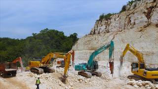 Massive Road Construction Excavators Bulldozer Trucks Digging Through The Limestone Hills