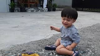 Baby Marco playing at Mama Vi's house in Loveland Subdivision