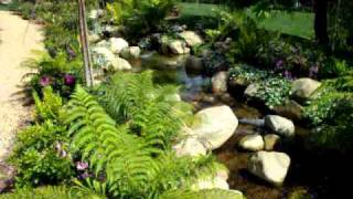 Super cool Koi pond and waterfall with creek