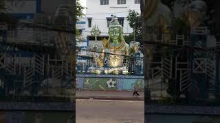 Shiva statue with changing colours in Kolkata Calcutta, West Bengal, India 03-2019