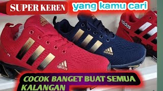 sepatu kets adidas dan nike serta suasana toko saat ppkm,