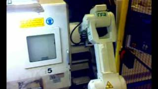 RFA Kawasaki Robotloader with RFA-Vision loading Okuma lathe