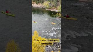 Kayaking close to a waterfall in the Northwest Territories