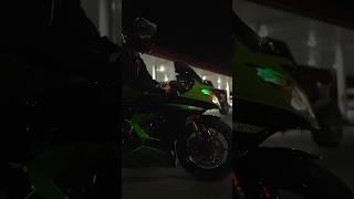 Bikes and a Genesis parked infront of flashing lights. Yep it's a car meet! #carmeet #shorts