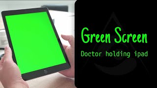 Exclusive: doctor holding an iPad tablet in his hands – free footage on chromakey. Stock video