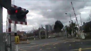 50th Video - Merrion Gates level crossing with 22000 class tone