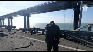 Russian military surveys damage to Crimea bridge 10/8/22