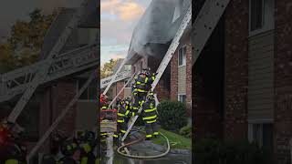 Man rescued from burning apartment. Carried down ladder by firefighters. #shorts #firefighter #👩‍🚒