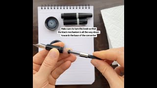 Filling a fountain pen using a converter