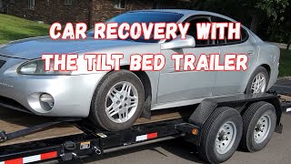 Load Trail gravity tilt trailer hauling a car.  How well will this trailer work in this situation?