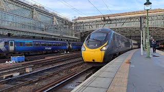 390 009 leaves Glasgow Central with a couple of tones (13/2/24)