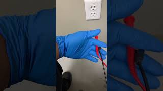 Checking the voltage of a wall electrical outlet with a multimeter #kleintools #electrical #voltage