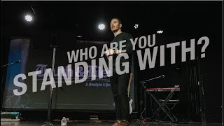 Who are you standing with?