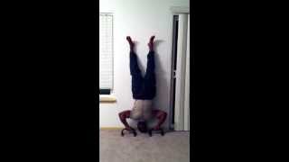 Handstand pushup training. (building str for one arm handstand pushups)