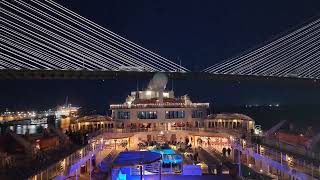 Carnival Elation Going Under Dames Bridge at night. February 1, 2024