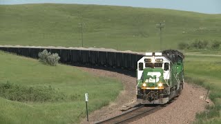 BN and ATSF colors on the Milwaukee Road Mainline:  Let the EMDs Roar!