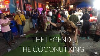 THE COCONUT KING - Street performer tosses COCONUT 40Mtr in the air! Jonker Walk Night Market!