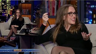 Kat Tempf sitting in a short black dress wearing sheer black pantyhose. TV show Gutfeld! 09_26_24