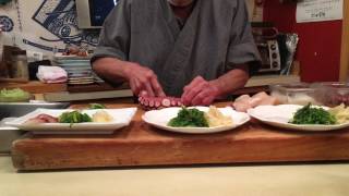 Plating the sashimi platter