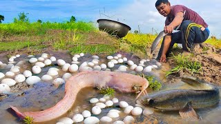 Best hand fishing, A fisherman catch fish at field by hand skill near village